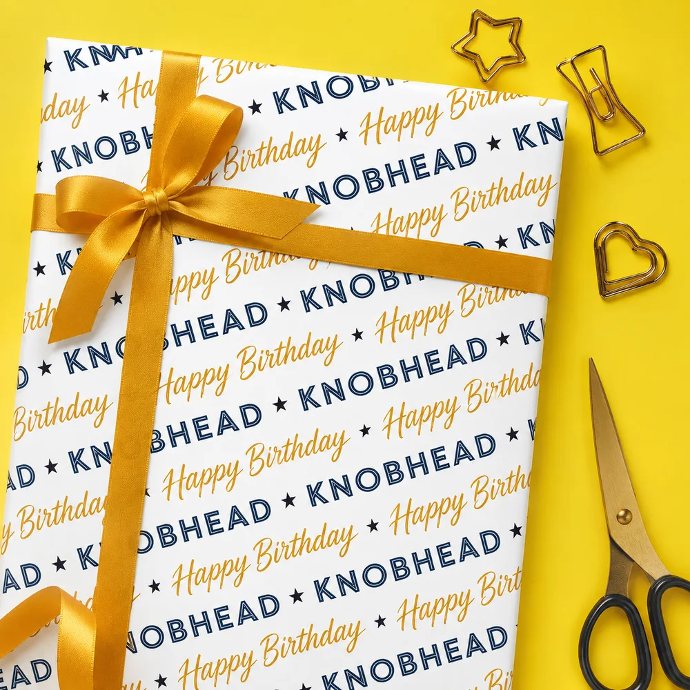 Cocky Cards Co. yellow birthday wrapping paper and gifts